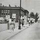 Protestors carried signs asking for school redistricting and integration. They were on the sidewalk in front of IPS School 17 in the 1960s.