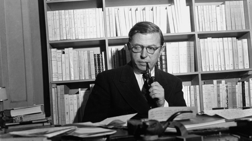 The French philosopher Jean-Paul Sartre in his study in Paris in 1948