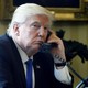 Trump speaks by phone with Merkel in the Oval Office at the White House in Washington