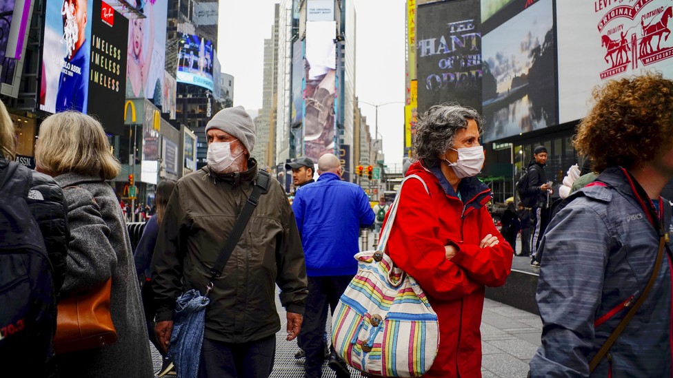 People wearing masks in Times Square
