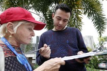 A Florida voter fills out a voter registration form in Miami, Florida, on October 11, 2016. 