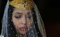 A close view of a veiled woman