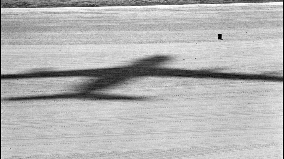 Photograph of a shadow of a plane
