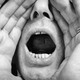 Person cupping their mouth to yell
