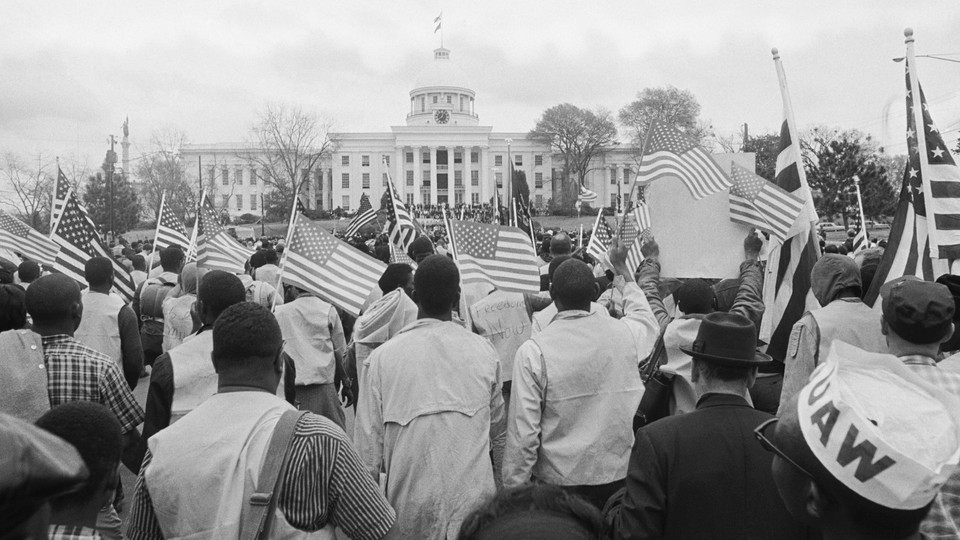 Civil-rights marchers arrive at the Alabama State Capitol in Montgomery, Alabama, after a 50-mile march from Selma to protest racial discrimination in voter registration, on March 23, 1965.