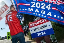 Supporters of former U.S. president and 2024 Republican presidential candidate Donald Trump and of candidate Robert F. Kennedy Jr. gather near the entrance to the Ronald Reagan Library, in Simi Valley, California, on September 27, 2023.