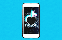 An image of an iPhone with a TikTok logo on the screen. The screen is cracked and there is a whole in the middle.