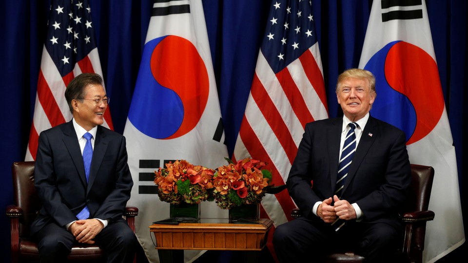 President Trump and South Korean President Moon Jae-in smile