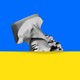 A photo illustration of a marble bust buried in the yellow stripe of the Ukrainian flag