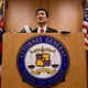 Hawaii Attorney General Douglas Chin speaks at a press conference after filing an amended lawsuit against Donald Trump's travel ban on March 9, 2017.