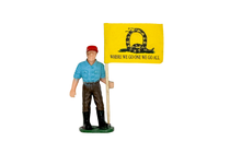 a toy man holding a 'where we go one we go all' flag.