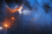 A large dark cloud is contained within the frame. Its top half is textured like smoke and has wispy gaps; at the bottom and at the sides, it fades gradually out of view. On the left are several orange stars.