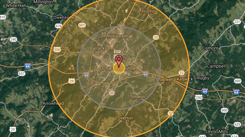 A satellite map with a pin, marked with the atomic symbol, and concentric circles over Charlottesville