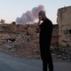 People in Beirut view the smoke rising above the site of an Israeli strike on Hassan Nasrallah.