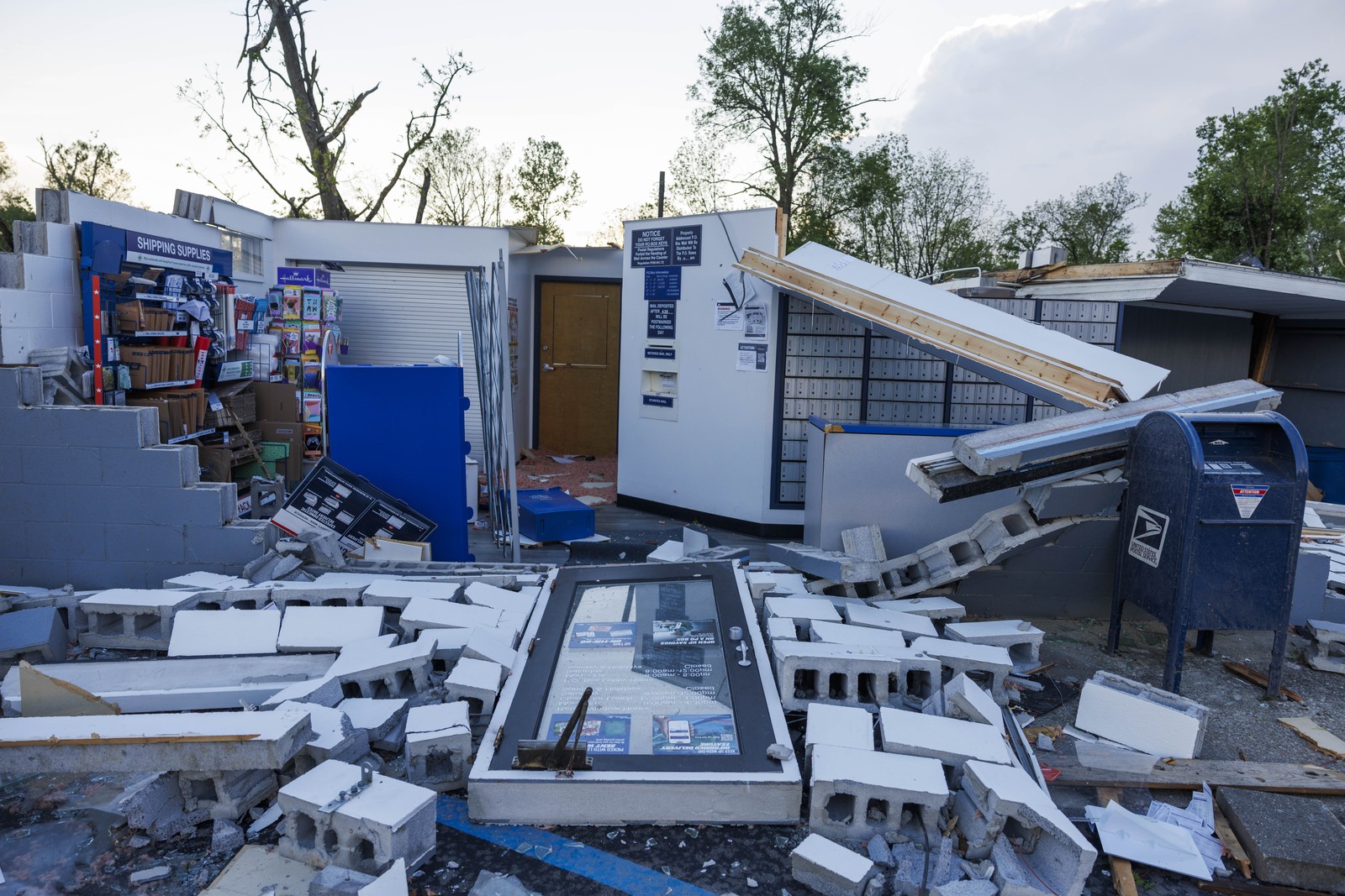 A ruined post office, smashed by a tornado.