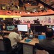 Staff work inside the headquarters of Al Jazeera Media Network in Doha, Qatar, on June 8, 2017.